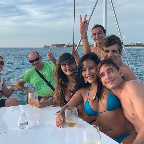 Luka Šulić et al. standing next to a body of water